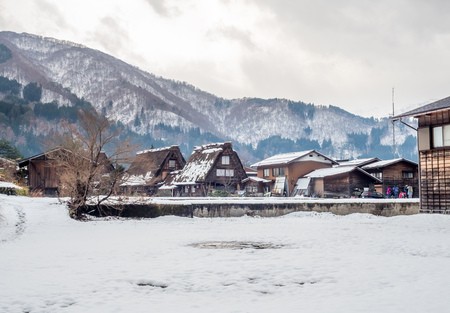 Gassho-zukuri unique architecture house in Shirakawa village, the UNESCO world heritage place, with snow in early winter season in Gifu, Japanのeditorial素材