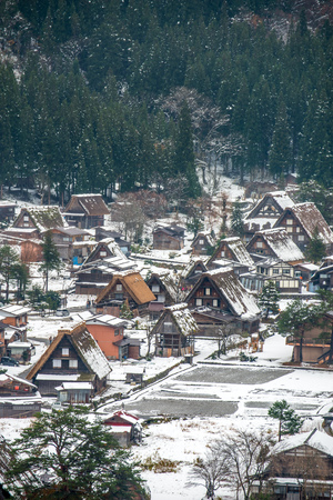 Gassho-zukuri house unique architecture in Shirakawa village, the UNESCO World heritage place, in early winter season in Gifu, Japanのeditorial素材