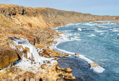 Urridafoss, the most voluminous waterfall in the country, at south near main road of Iceland in winter seasonの写真素材