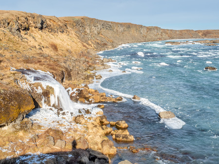 Urridafoss, the most voluminous waterfall in the country, at south near main road of Iceland in winter seasonの写真素材