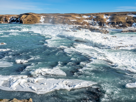 Urridafoss, the most voluminous waterfall in the country, at south near main road of Iceland in winter seasonの写真素材