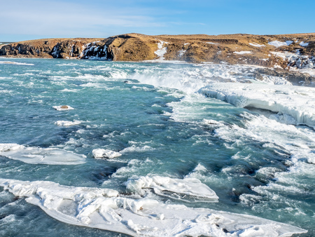 Urridafoss, the most voluminous waterfall in the country, at south near main road of Iceland in winter seasonの写真素材