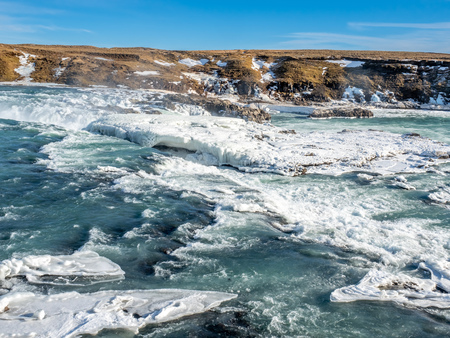 Urridafoss, the most voluminous waterfall in the country, at south near main road of Iceland in winter seasonの写真素材