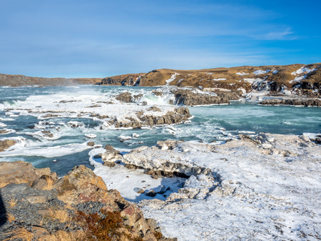 Urridafoss, the most voluminous waterfall in the country, at south near main road of Iceland in winter seasonの写真素材
