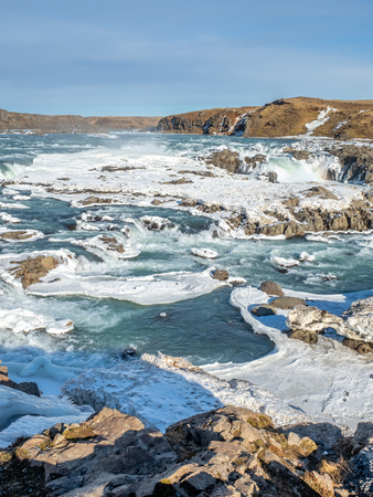 Urridafoss, the most voluminous waterfall in the country, at south near main road of Iceland in winter seasonの写真素材