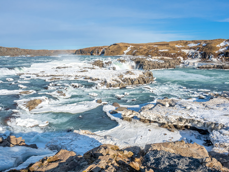 Urridafoss, the most voluminous waterfall in the country, at south near main road of Iceland in winter seasonの写真素材