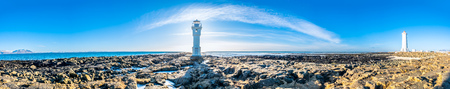 Panoramic view of two lighthouses at peninsula coastline of Akranes town in Icelandの写真素材