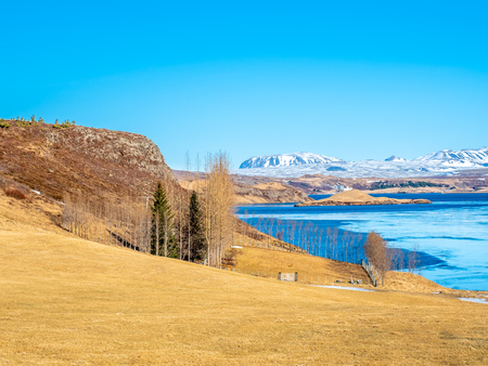 Ulfljotfvatn lake located in southern of Iceland, beautiful view under clear blue sky in winter seasonの写真素材