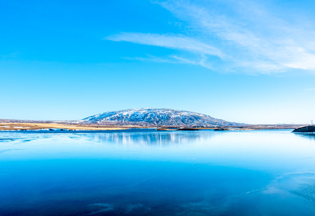 Ulfljotfvatn lake located in southern of Iceland, beautiful view under clear blue sky in winter seasonの写真素材