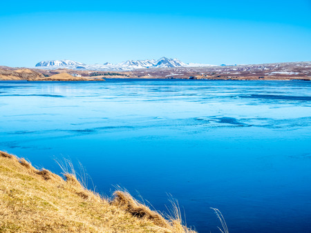 Ulfljotfvatn lake located in southern of Iceland, beautiful view under clear blue sky in winter seasonの写真素材