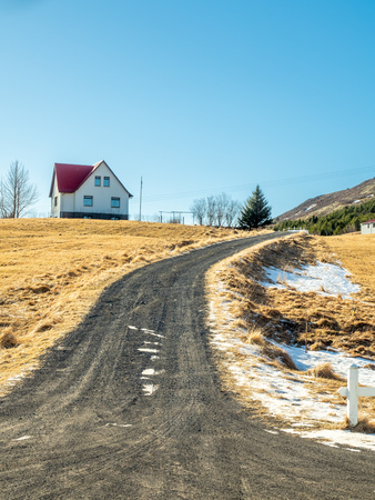Landscape view on hill near Ulfljotsvatn lake in Iceland under clear blue skyの写真素材