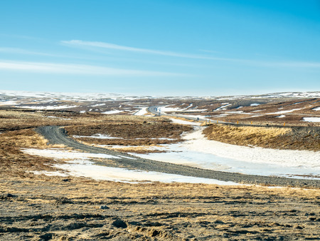 Landscape beautiful view, lake, mountains and field under cloudy blue sky in winter season, Icelandの写真素材