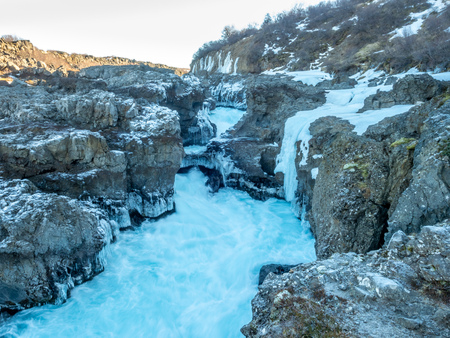 Barnafoss waterfall, water become ice crystal in winter season in Icelandの写真素材
