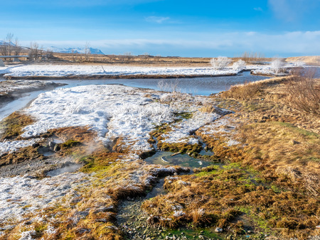 Beautiful scene in winter season around Deildartunguhver, the most power ful hot spring in Europe, underground heat energy for many cities in Icelandの写真素材