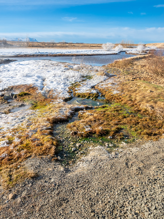 Beautiful scene in winter season around Deildartunguhver, the most power ful hot spring in Europe, underground heat energy for many cities in Icelandの写真素材
