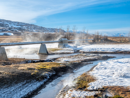 Beautiful scene in winter season around Deildartunguhver, the most power ful hot spring in Europe, underground heat energy for many cities in Icelandの写真素材