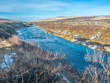 Hraunfossar waterall, Lava fall, one of unusual beautiful water cliff in Icelandの写真素材
