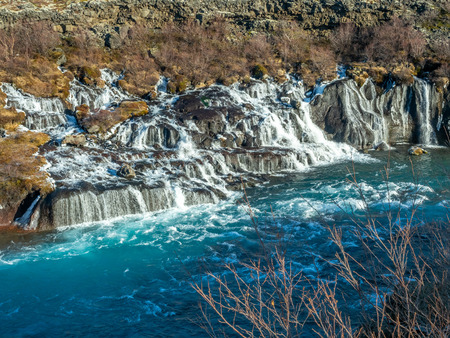 Hraunfossar waterall, Lava fall, one of unusual beautiful water cliff in Icelandの写真素材