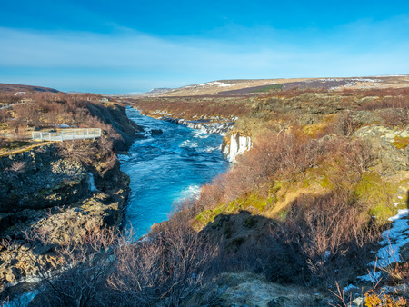 Surrounding view around Hraunfossar waterfall, unusual beautiful natural landmark in Iceland, during winter seasonの写真素材