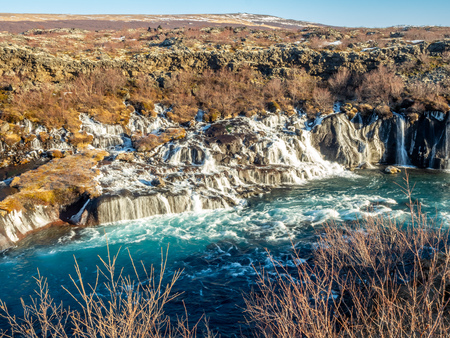 Hraunfossar waterall, Lava fall, one of unusual beautiful water cliff in Icelandの写真素材