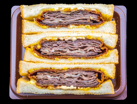 Beef meat sandwiches, delicous famous Japanese style fast food, pack in plastic set, isolated on black backgroundのeditorial素材