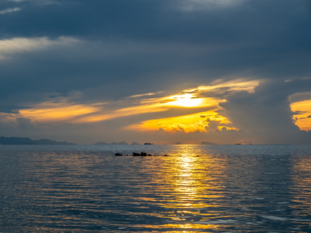 Seascape view under sunset cloudy blue sky in evening twilight time at Samui island, Thailandの写真素材