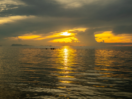 Seascape view under sunset cloudy blue sky in evening twilight time at Samui island, Thailandの写真素材