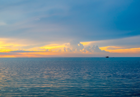 Seascape view under sunset cloudy blue sky in evening twilight time at Samui island, Thailandの写真素材