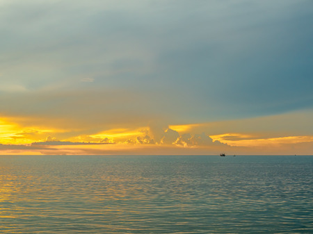 Seascape view under sunset cloudy blue sky in evening twilight time at Samui island, Thailandの写真素材