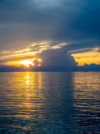 Seascape view under sunset cloudy blue sky in evening twilight time at Samui island, Thailandの写真素材