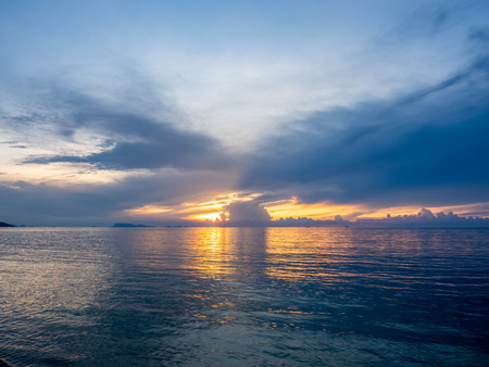 Seascape view under sunset cloudy blue sky in evening twilight time at Samui island, Thailandの写真素材