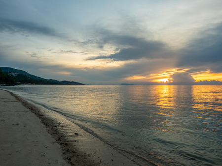 Seascape view under sunset cloudy blue sky in evening twilight time at Samui island, Thailandの写真素材
