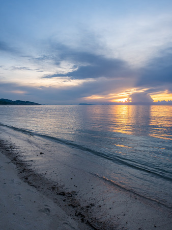 Seascape view under sunset cloudy blue sky in evening twilight time at Samui island, Thailandの写真素材