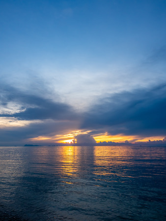 Seascape view under sunset cloudy blue sky in evening twilight time at Samui island, Thailandの写真素材