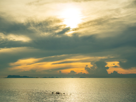 Seascape view under sunset cloudy blue sky in evening twilight time at Samui island, Thailandの写真素材