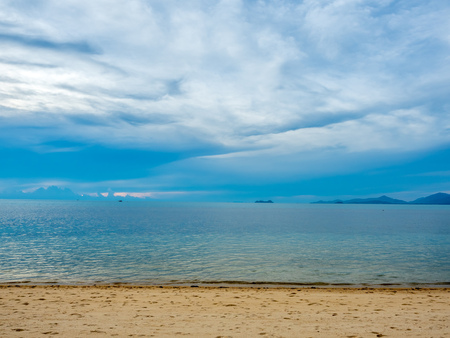 Seascape view under sunset cloudy blue sky in evening twilight time at Samui island, Thailandの写真素材