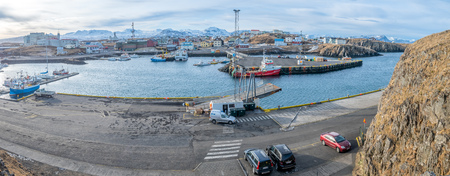 STYKKISHOLMUR, ICELAND - MARCH 9 : Commercial harbor with ships and boats in bays with cityscape view at Stykkisholmur town in Iceland, was taken on March 9, 2018.のeditorial素材