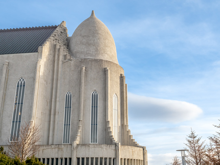 Hallgrimskirkja church, the most famous landmark place of Iceland, under cloudy morning blue sky in winter season, Reykjavik, Icelandの写真素材