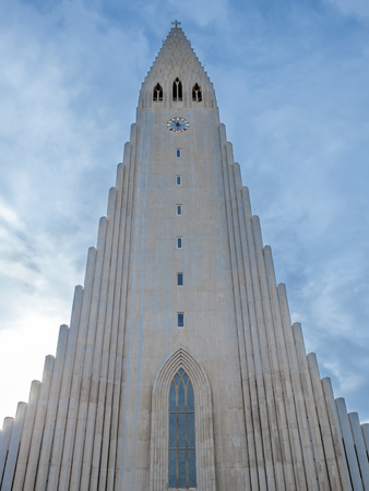 Hallgrimskirkja church, the most famous landmark place of Iceland, under cloudy morning blue sky in winter season, Reykjavik, Icelandの写真素材