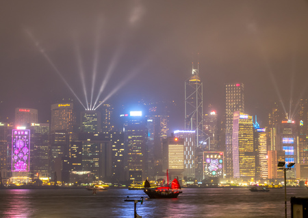 HONG KONG, CHINA - JANUARY 19 : Night light show with skyscraper buildings at Victoria harbor, Hong Kong, China, on January 19, 2018.のeditorial素材
