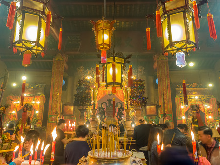 HONG KONG, CHINA - JANUARY 20 : Man Mo temple with full of incense smoke from respect people, landmark at central district of Hong Kong, China, on January 20, 2018.のeditorial素材