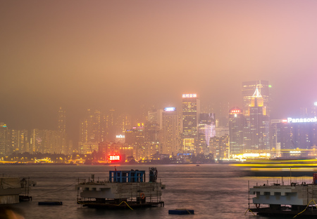 HONG KONG, CHINA - JANUARY 19 : Night light show with skyscraper buildings at Victoria harbor, Hong Kong, China, on January 19, 2018.のeditorial素材