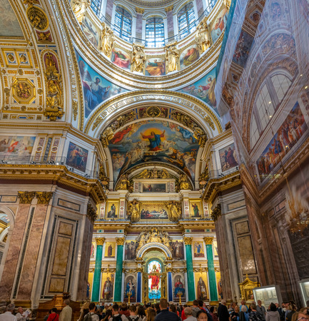 SAINT PETERSBURG, RUSSIA - SEPTEMBER 4, 2018 : Sophisticated interior architecture of St. Isaac's Cathedral, altar, dome, painting, sculpture, art, in Saint Petersburg, Russiaのeditorial素材