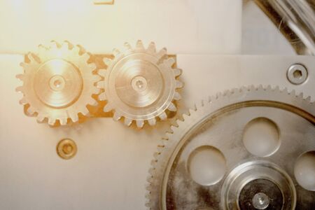 Parts of gear system , Close up of mechanical heavy steel metal wheel cog. Concept business idea....