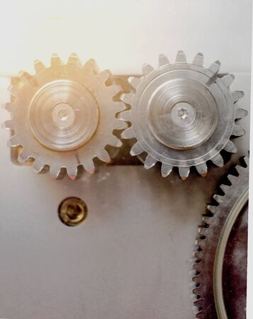 Parts of gear system , Close up of mechanical heavy steel metal wheel cog. Concept business idea....