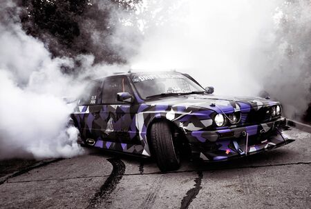 Moldova 25.09.2019. Sport modern Stance Car racing car drifting with smoke drift burnout, big...