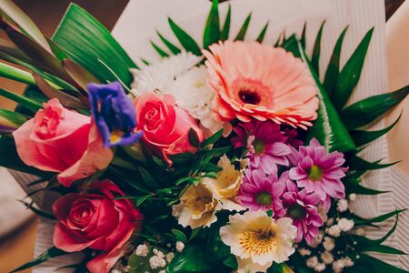 Bunch of Pink tulips white gerbera daisy  bouquet of mixed flowers.  Fresh spring Summer backgroundの写真素材