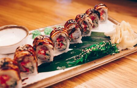 A large set of Delicious sushi rolls view from above Flat Lay . A lot assortment Philadelphia roll...
