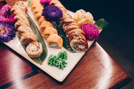 A large set of Delicious sushi rolls view from above Flat Lay . A lot assortment Philadelphia roll...