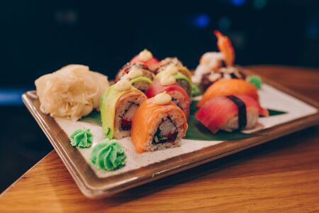 Large set of Sushi Rolls Warm Ebi Sake Unagi Spring. Assortment Philadelphia roll Dishes from Japanese raw fish in one plate in luxury traditional restaurant. Japan food menu serviceの写真素材